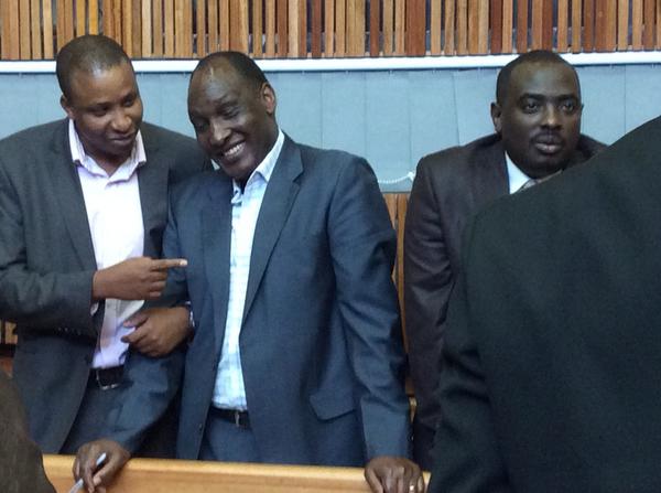 Mistaken: Kayumba Nyamwasa in court with friends and family in court. He believes that the judgement is a 'landmark' one proving that the Rwandan government attacks its opponents.   