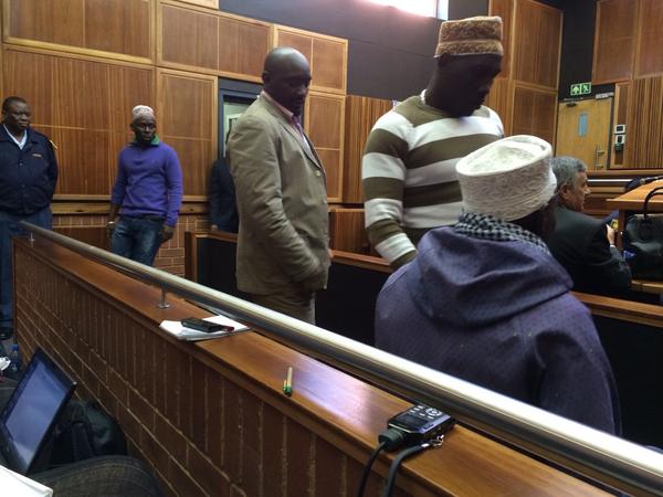 The six men who were accused of attempting to murder Kayumba Nyamwasa entering court on Friday